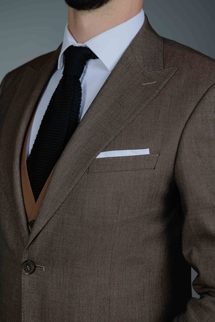 Three-piece brown suit