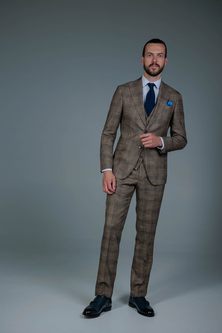 Three-piece brown check suit
