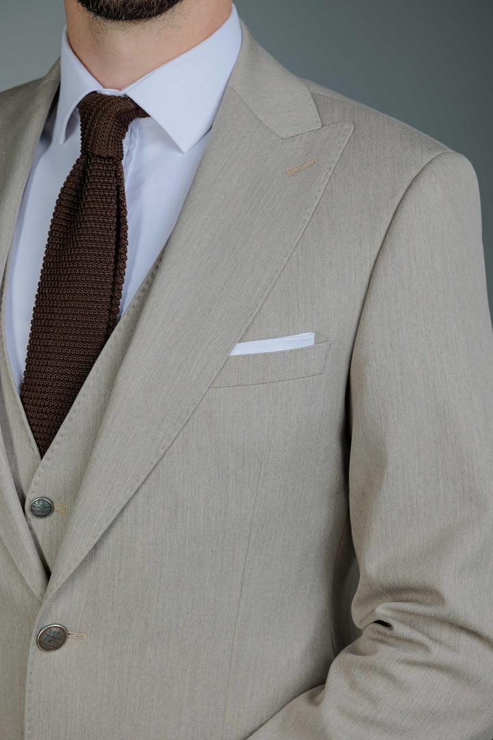 Three-piece suit in cream color