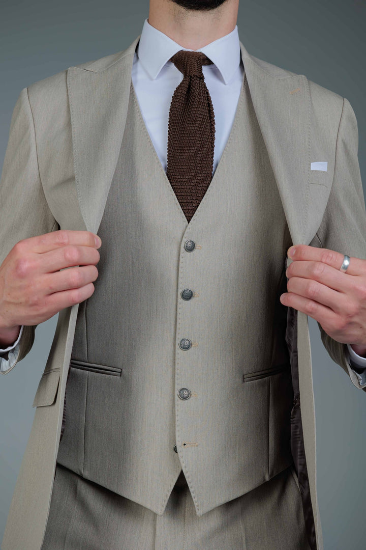 Three-piece suit in cream color