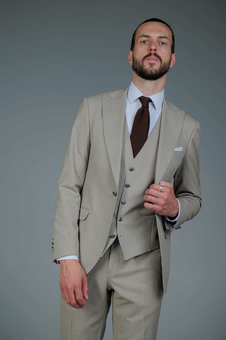 Three-piece suit in cream color