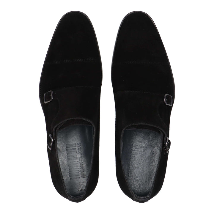 Black patent leather ankle boots with two buckles