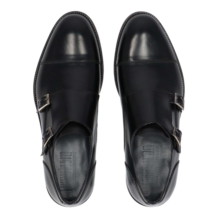 Black leather loafers with two buckles