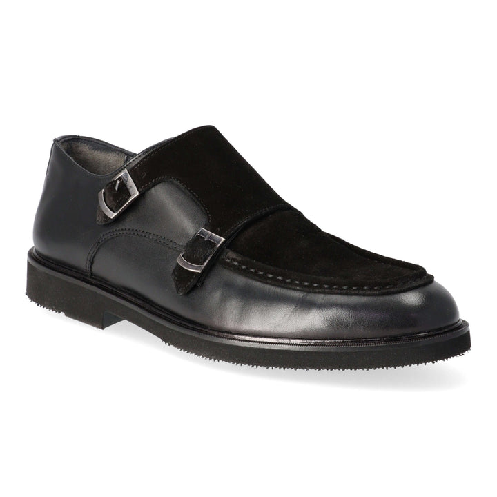 Black leather loafers with two buckles and a twisted leather detail