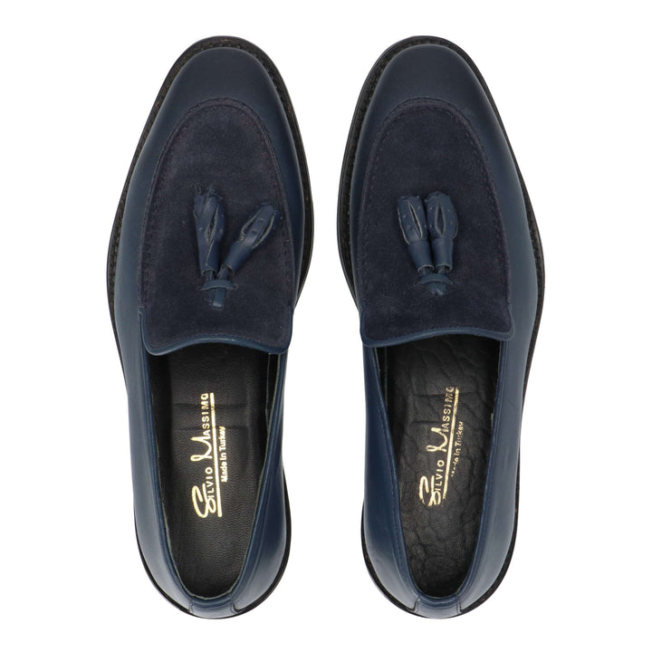 Blue leather loafers with turned leather detail