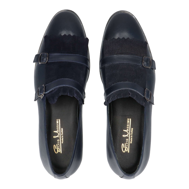 Blue leather loafers with turned leather detail and buckles