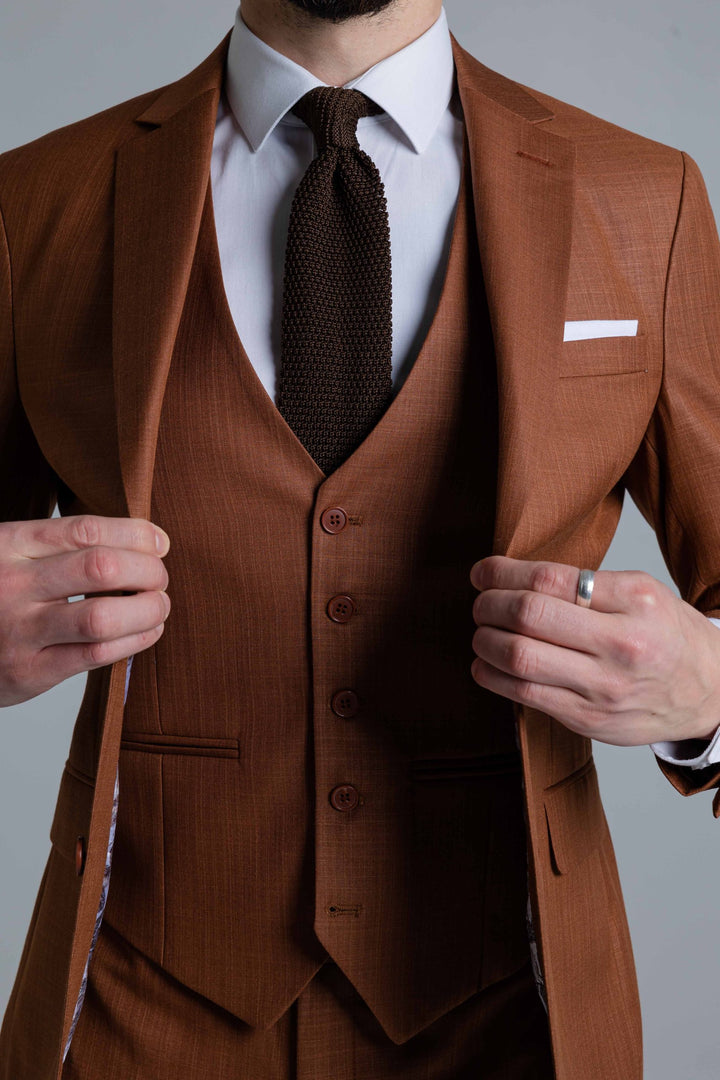 Three-piece brown suit