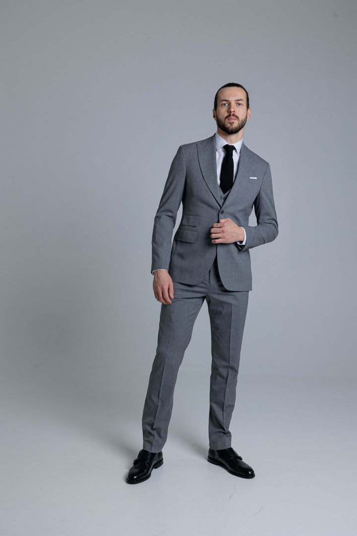 Three-piece gray suit with thin lines texture