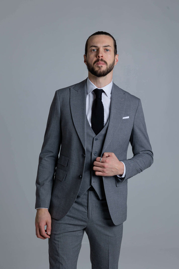 Three-piece gray suit with thin lines texture
