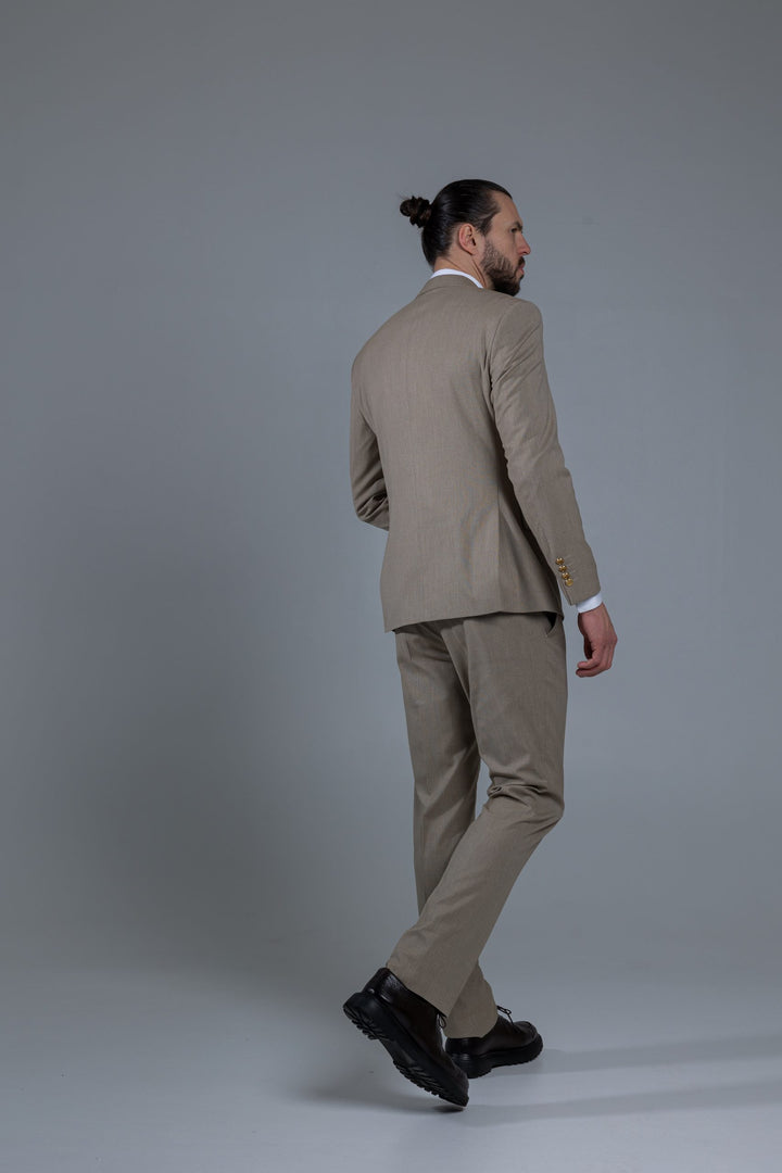 Two-piece cream suit with double-breasted jacket