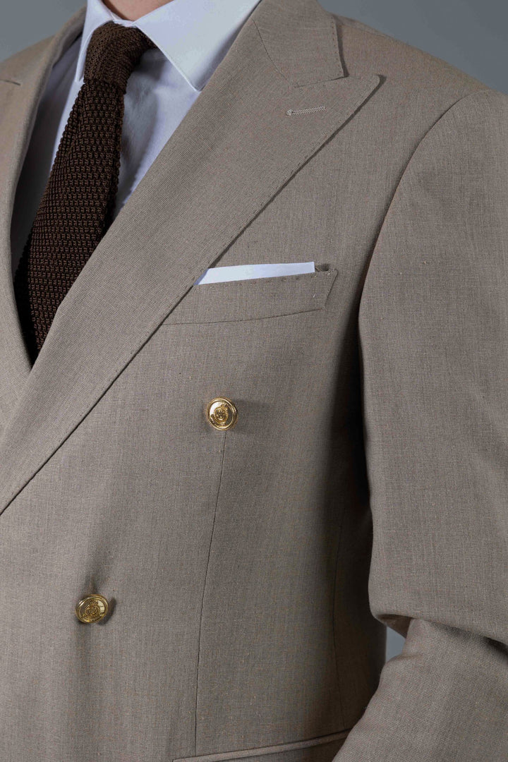 Two-piece cream suit with double-breasted jacket