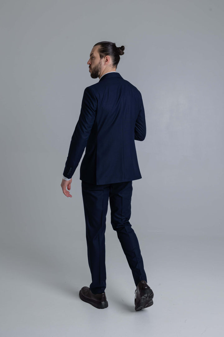 Two-piece blue suit with double-breasted jacket