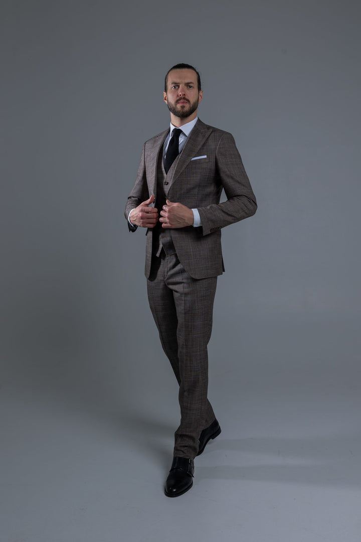 Three-piece brown suit