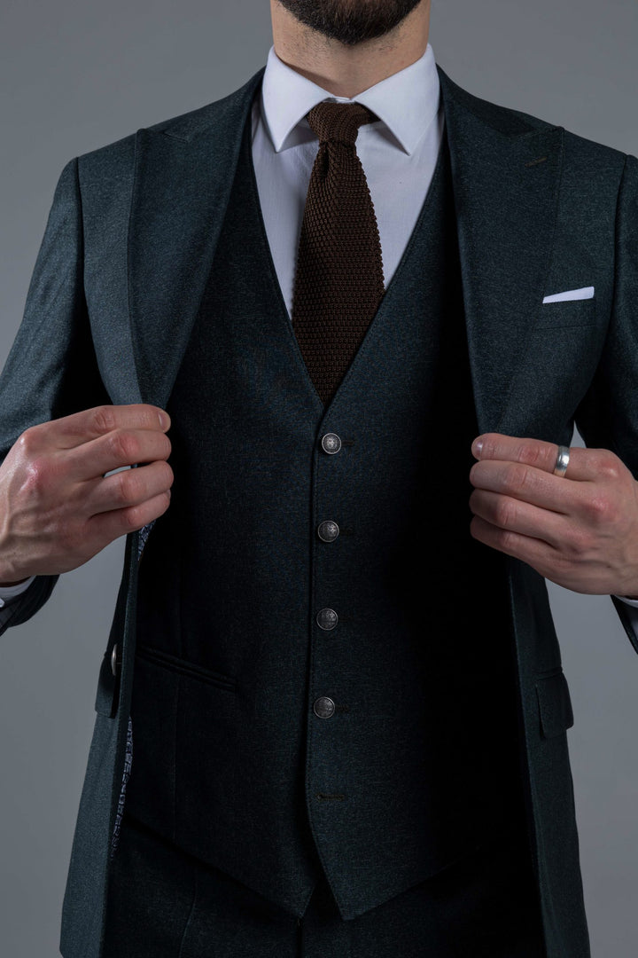 Three-piece dark green suit