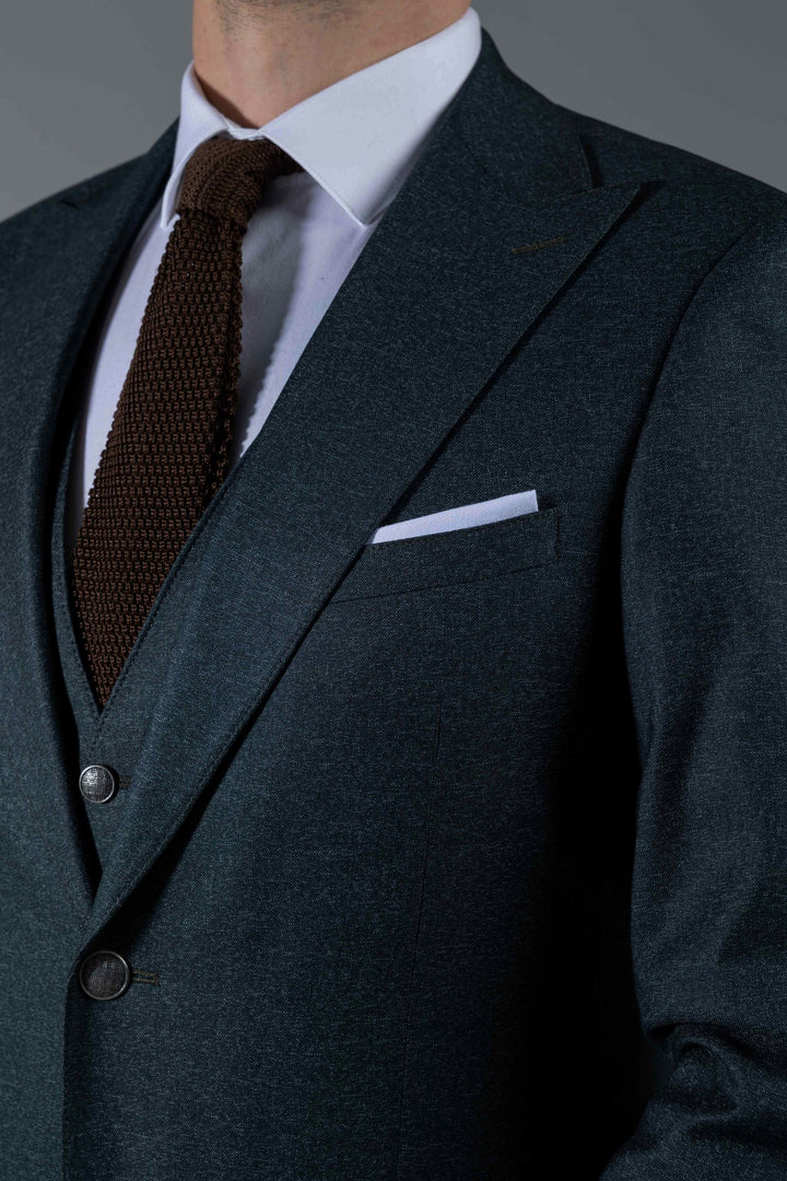 Three-piece dark green suit