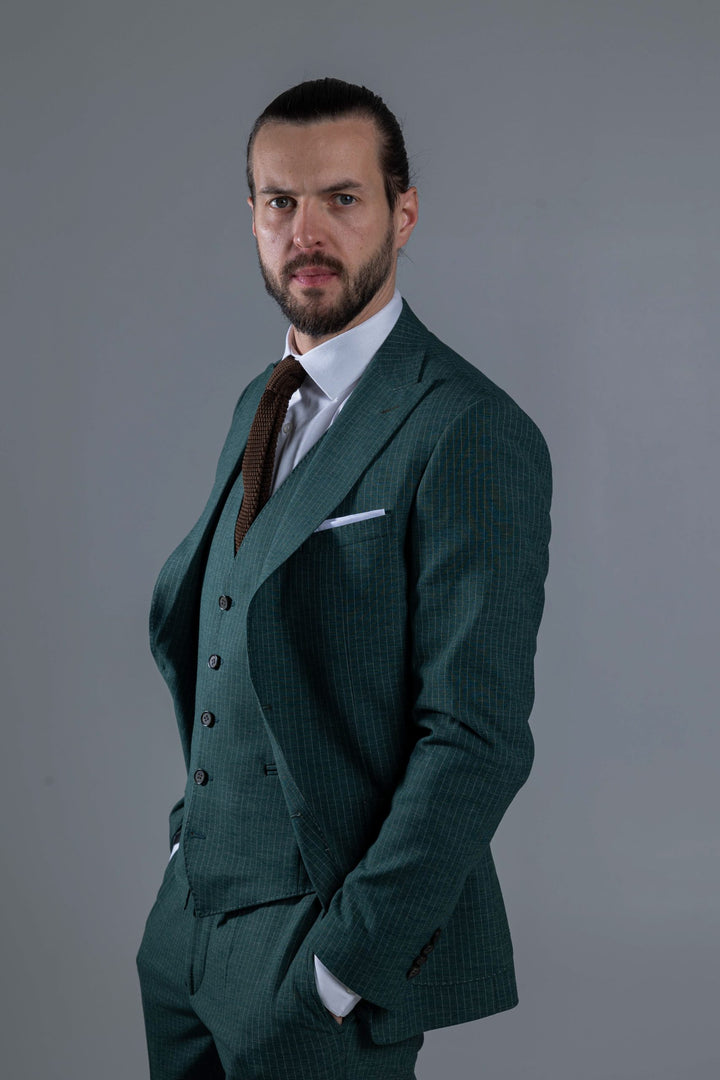 Three-piece green suit with stripes