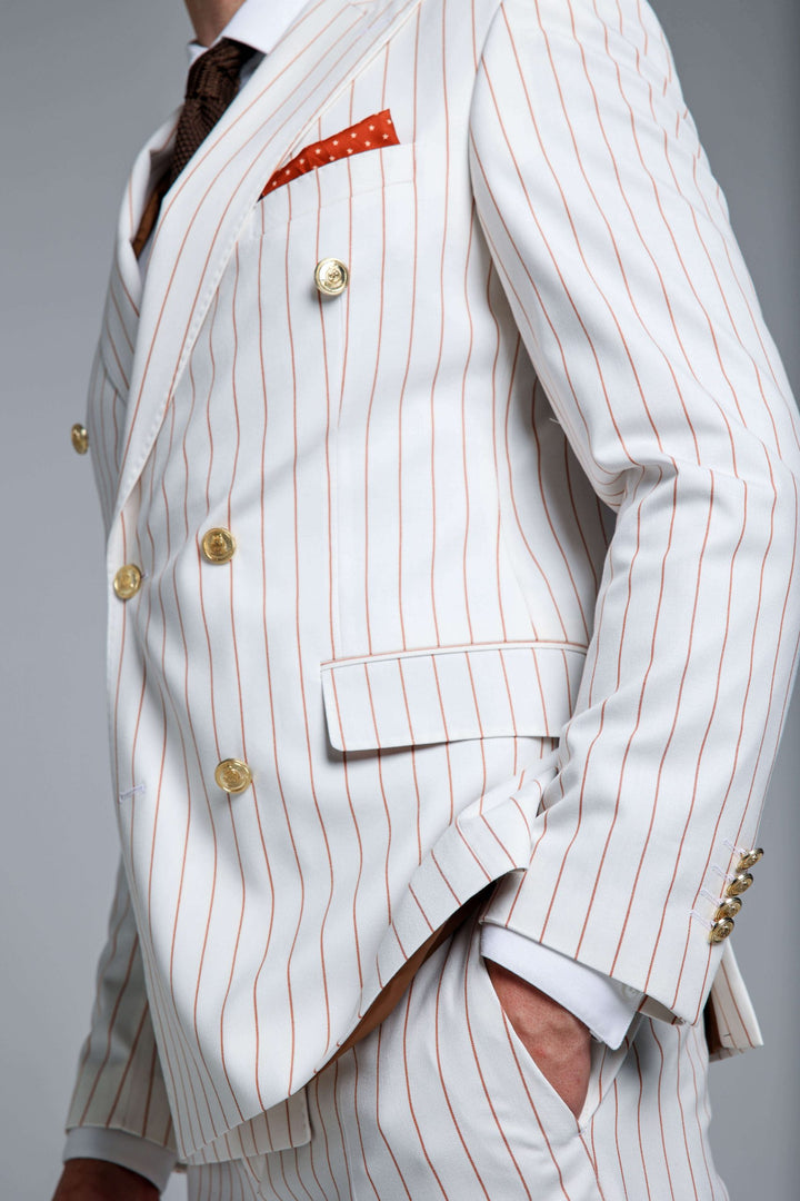 Two-piece white suit with double-breasted jacket and stripes