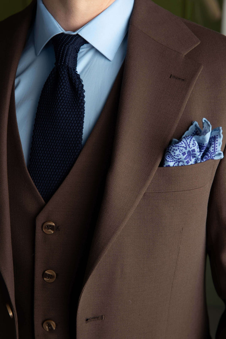 Three-piece brown suit