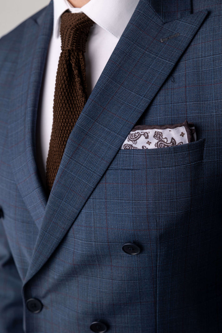 Two-piece blue suit with fine print and double-breasted jacket