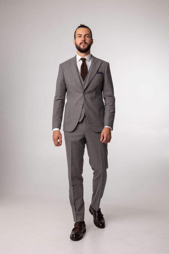 Three-piece gray suit with brown stripes