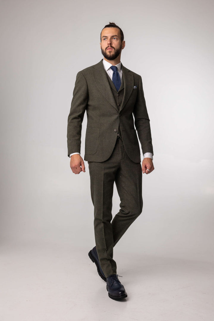 Green three-piece suit