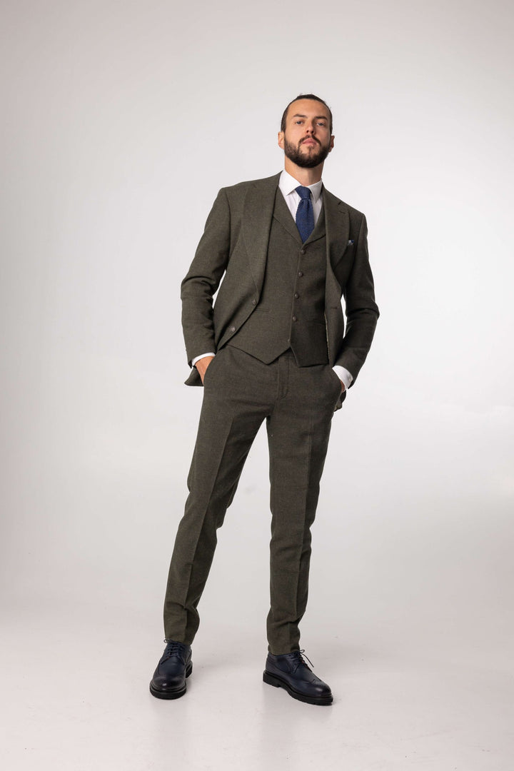 Green three-piece suit