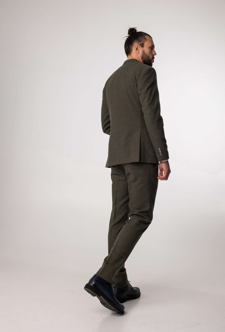 Green three-piece suit