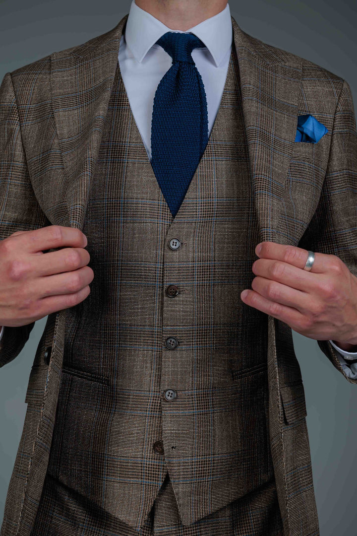 Three-piece brown check suit