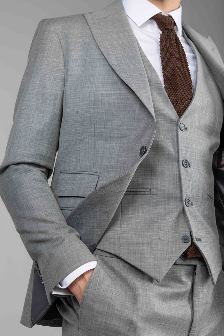 Three-piece light gray suit