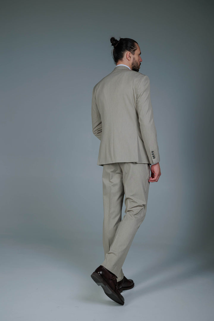 Three-piece suit in cream color