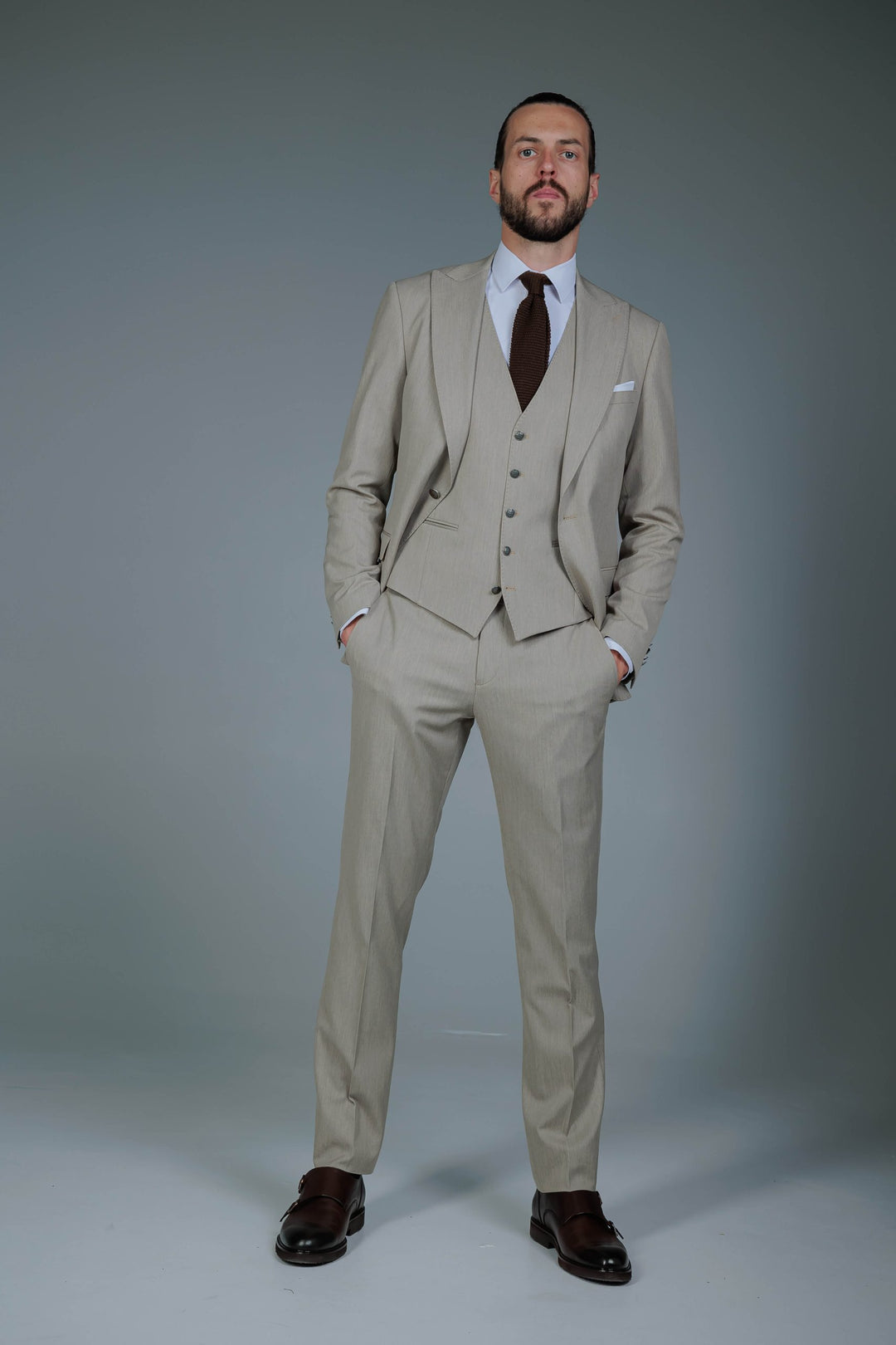 Three-piece suit in cream color