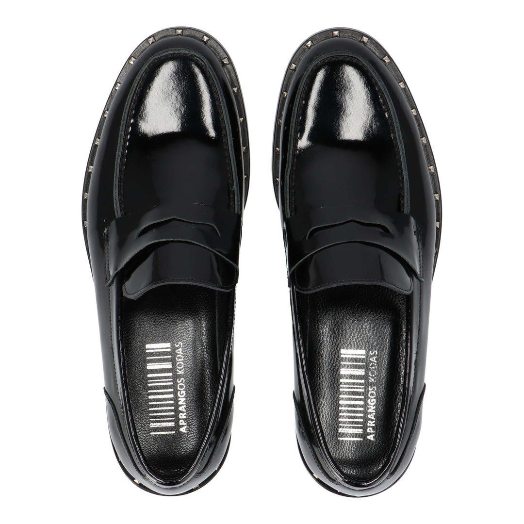 Black patent leather loafers with rivets