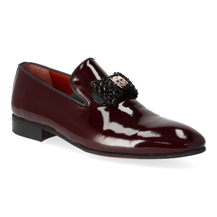 Burgundy patent leather loafers with black detail