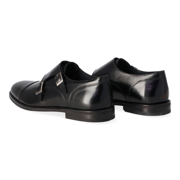 Black leather loafers with two buckles