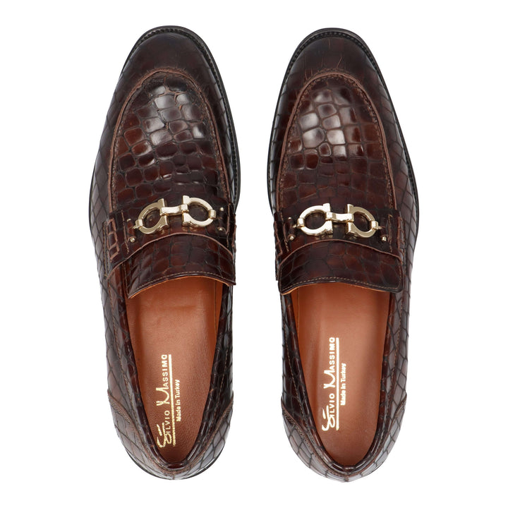 Brown leather loafers with gold details