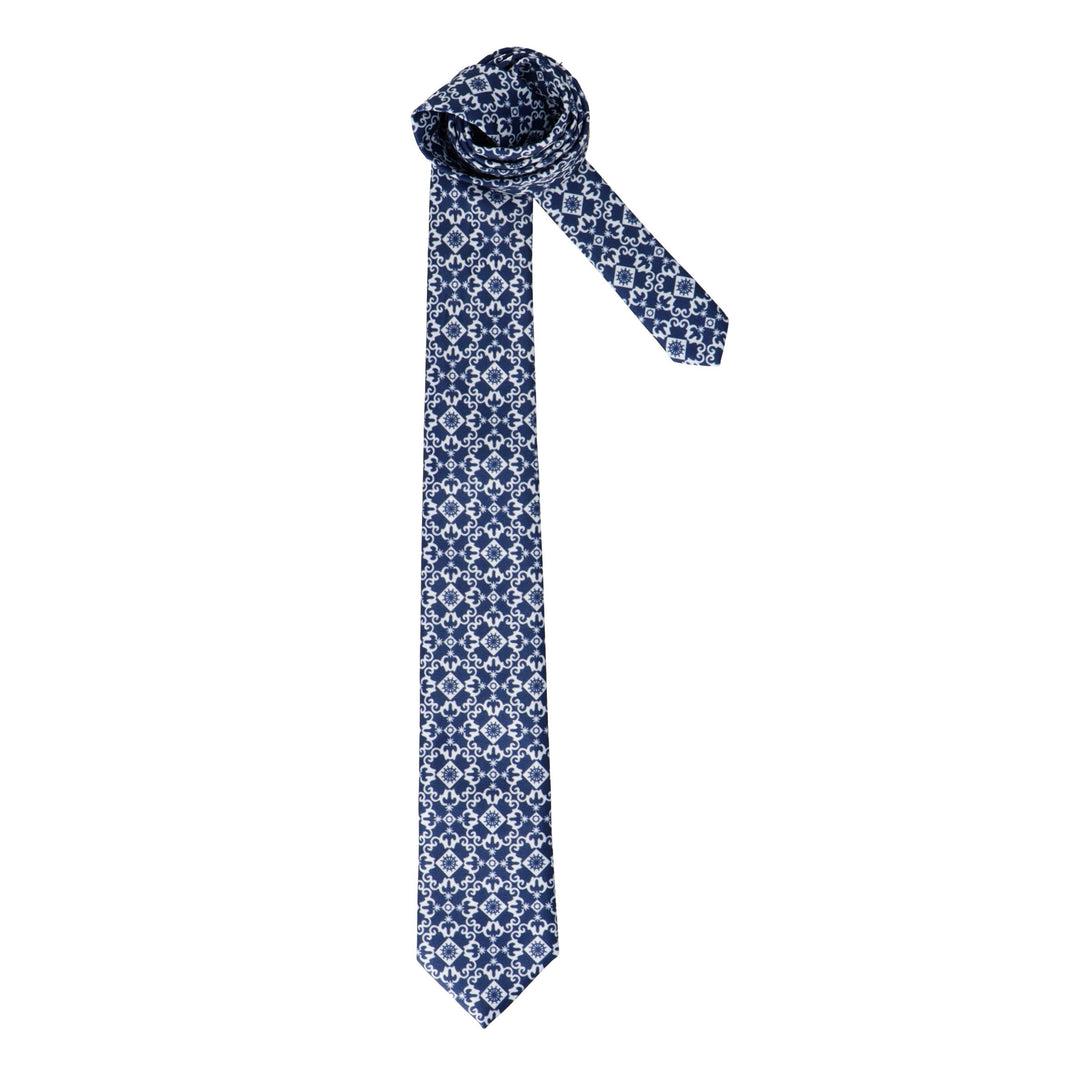 Blue tie with white pattern