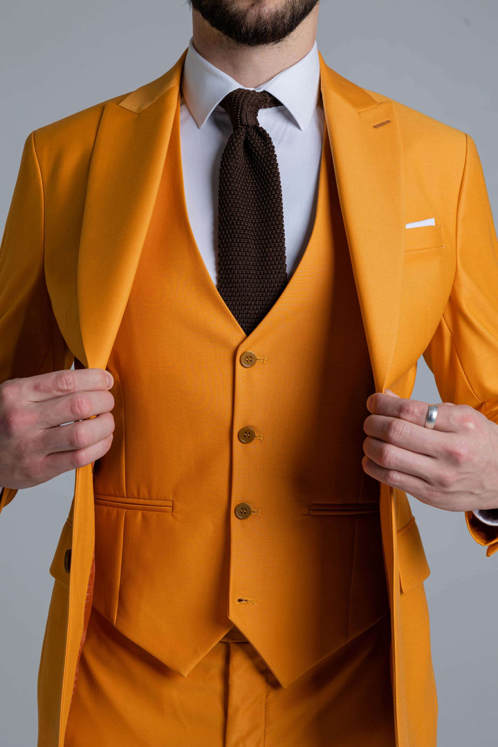 Three-piece yellow-orange suit