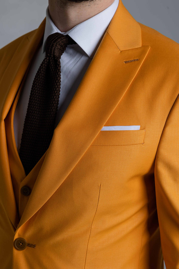 Three-piece yellow-orange suit