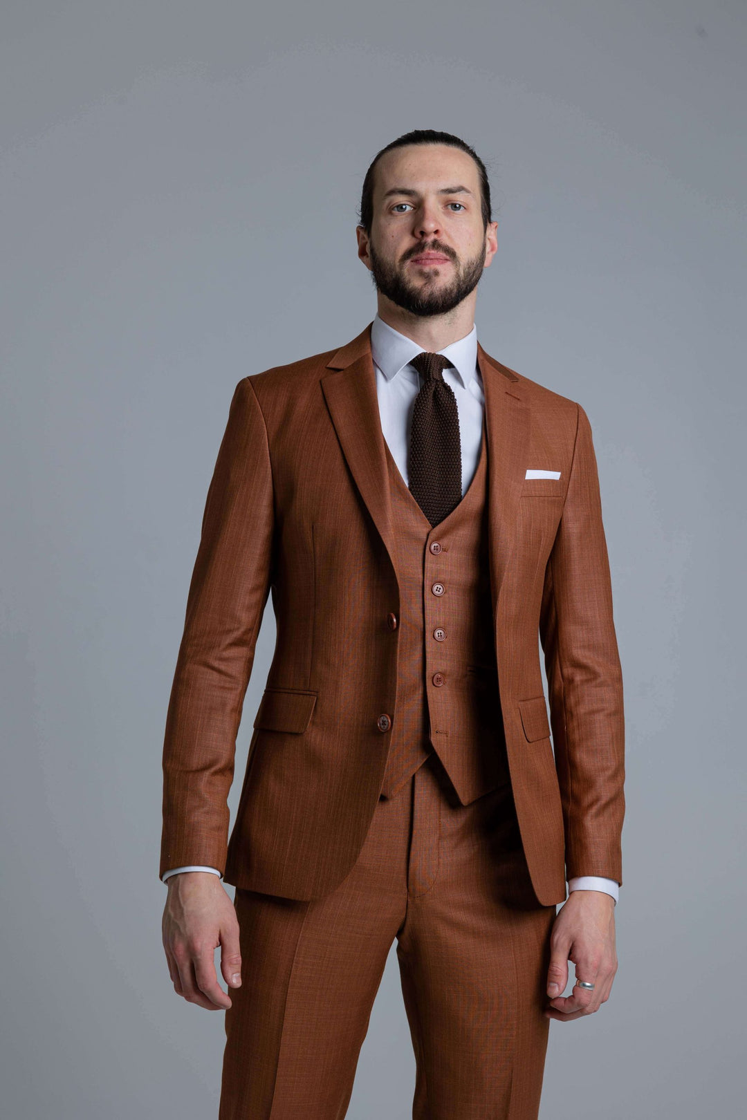 Three-piece brown suit