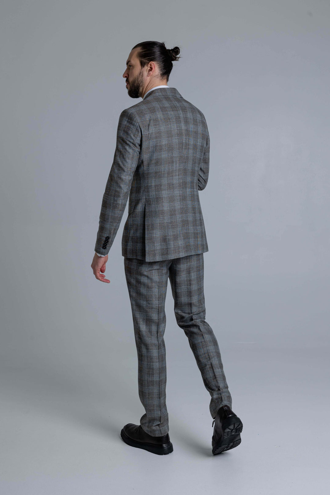 Three-piece gray-brown checked suit