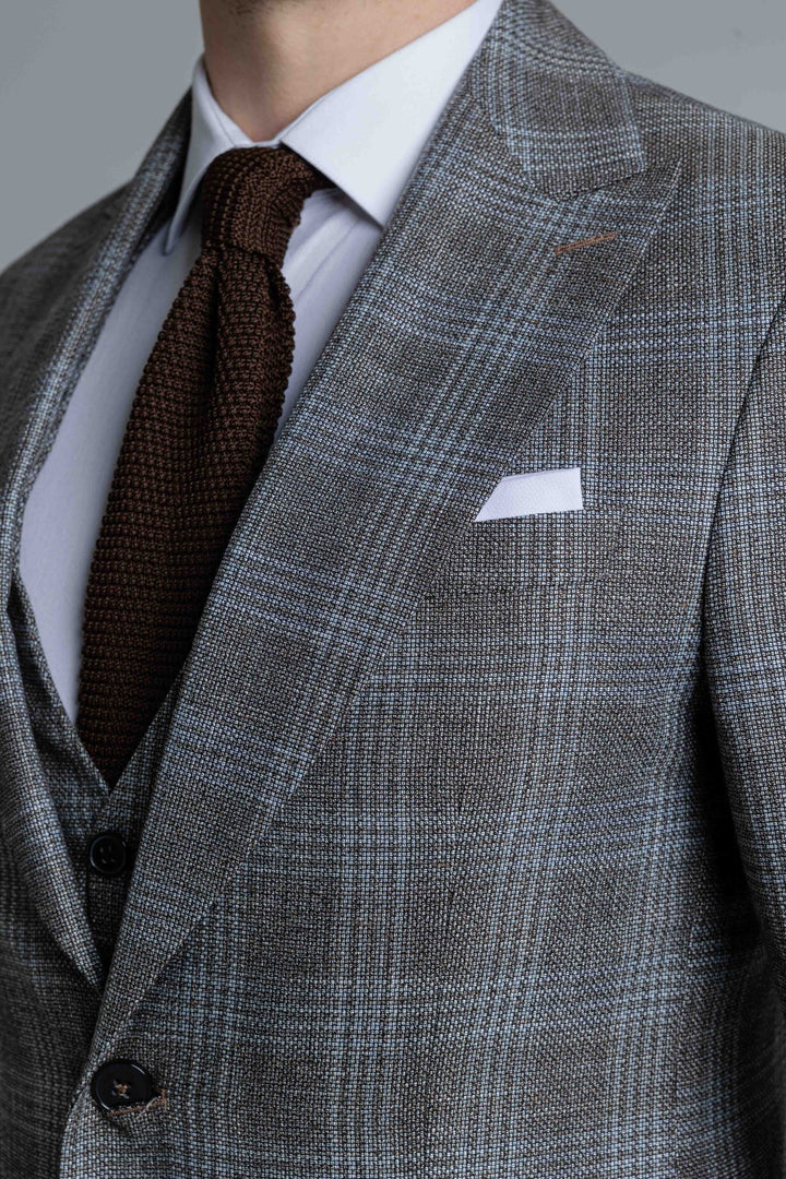 Three-piece gray-brown checked suit