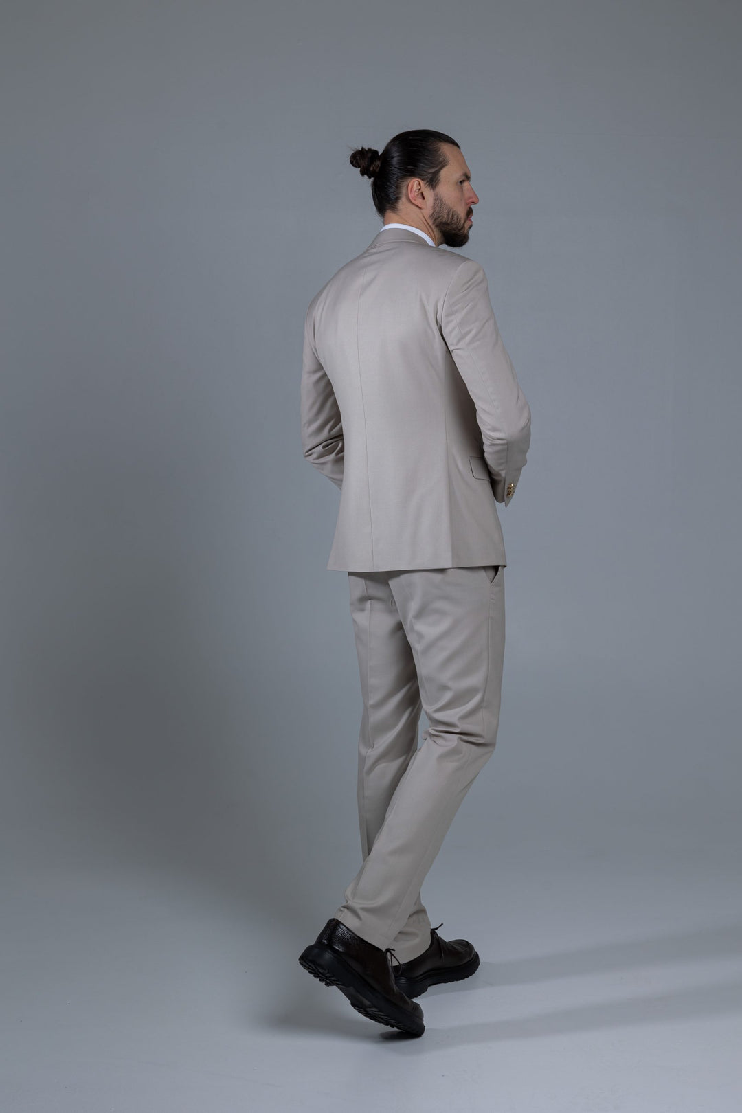 Three-piece suit in cream color