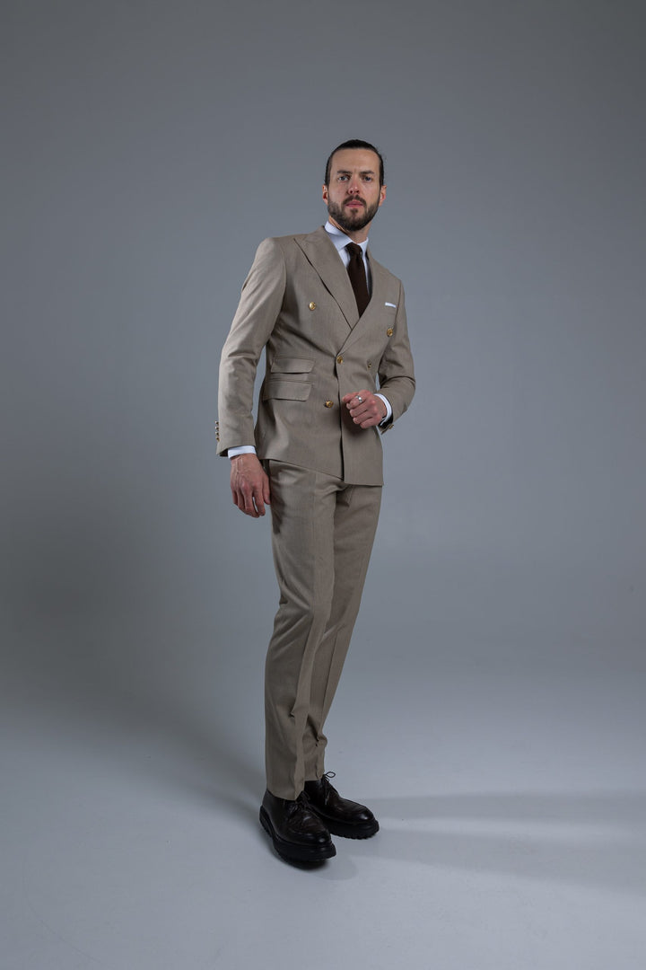 Two-piece cream suit with double-breasted jacket