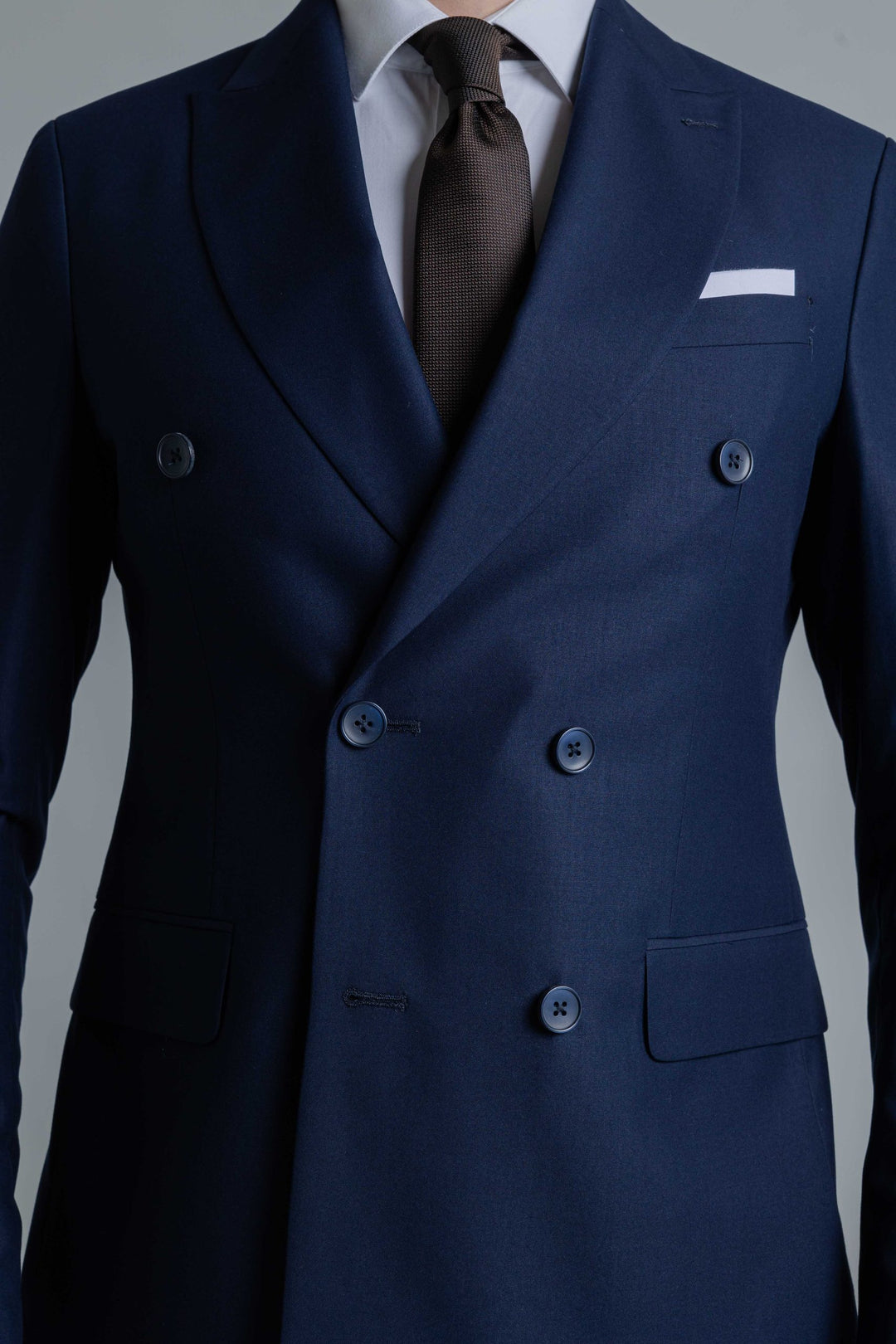 Two-piece blue suit with double-breasted jacket