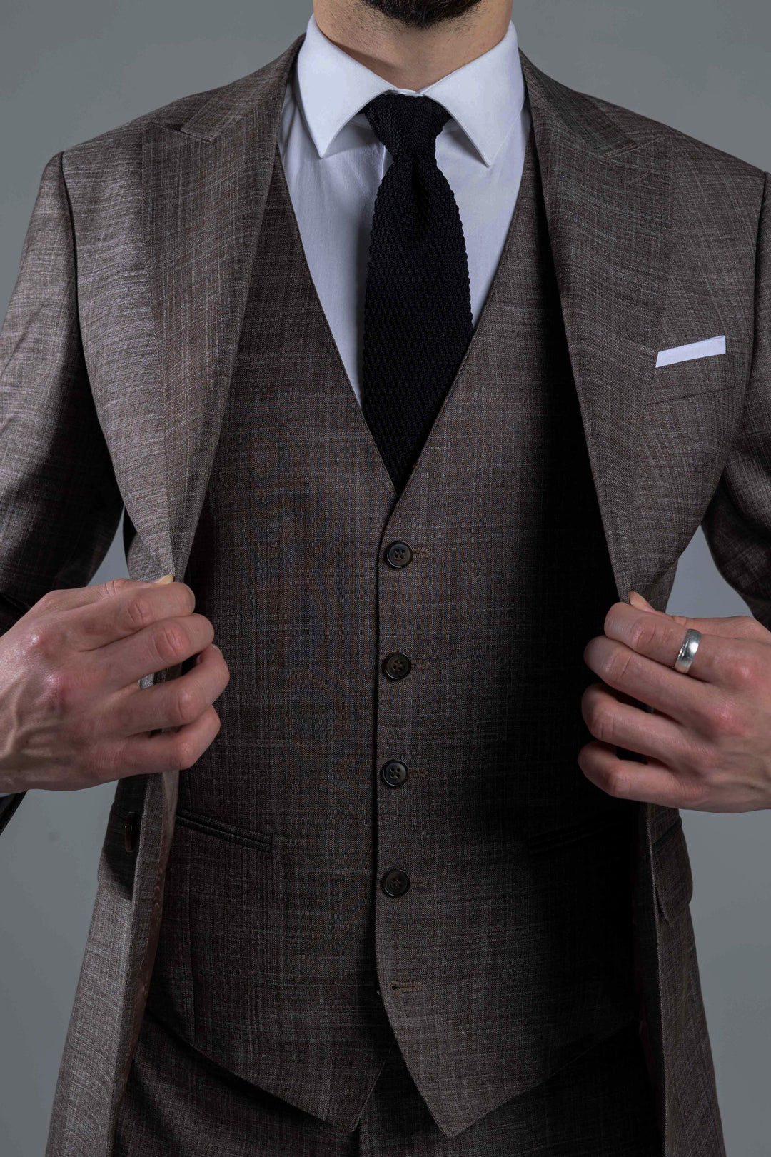 Three-piece brown suit