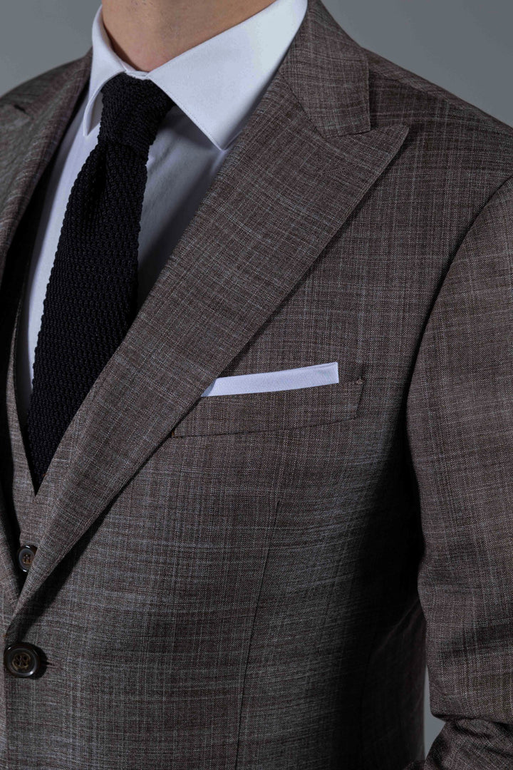 Three-piece brown suit