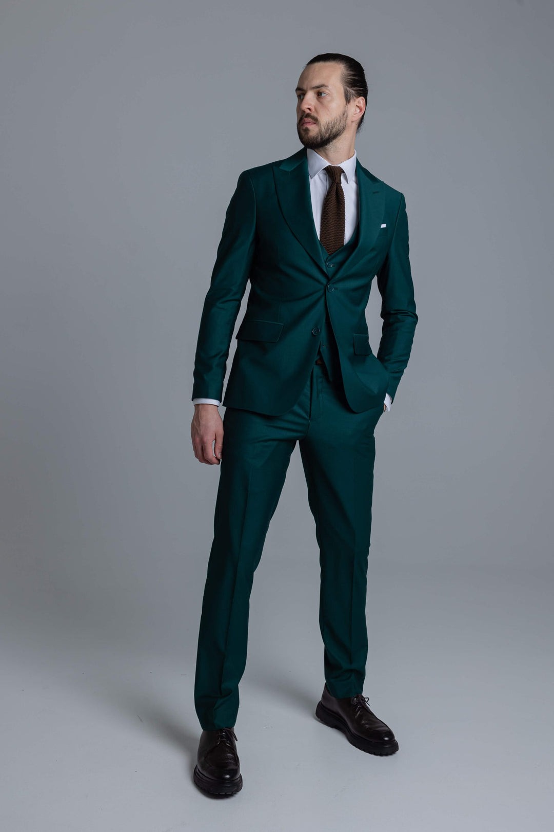 Three-piece green suit