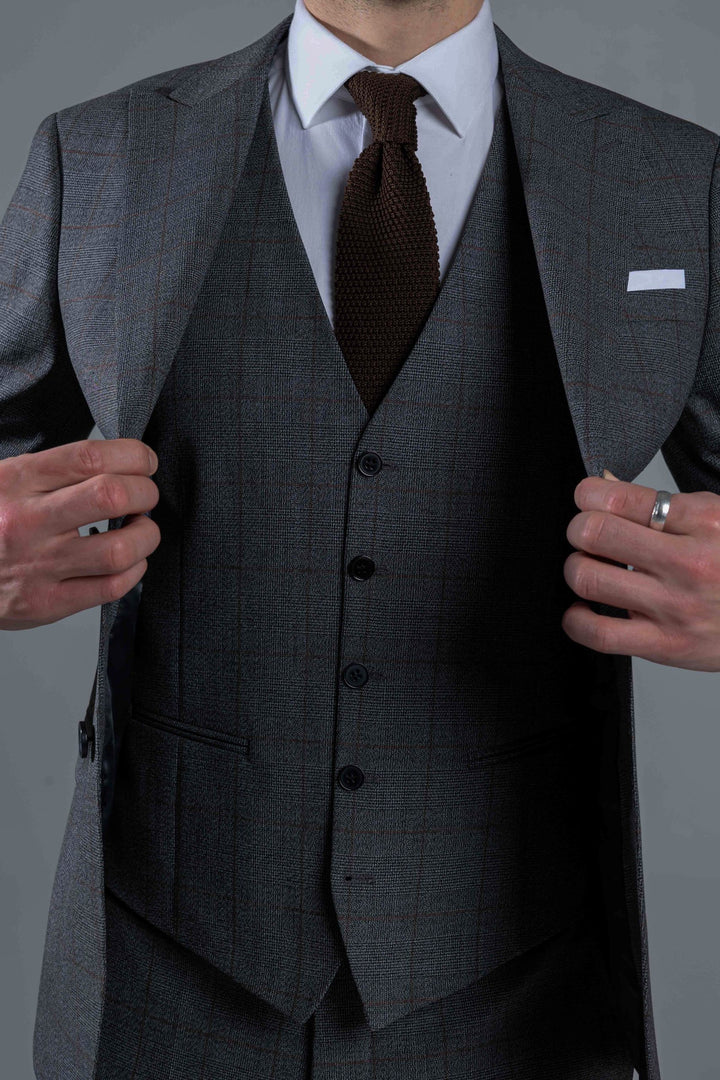 Three-piece gray suit with brown check