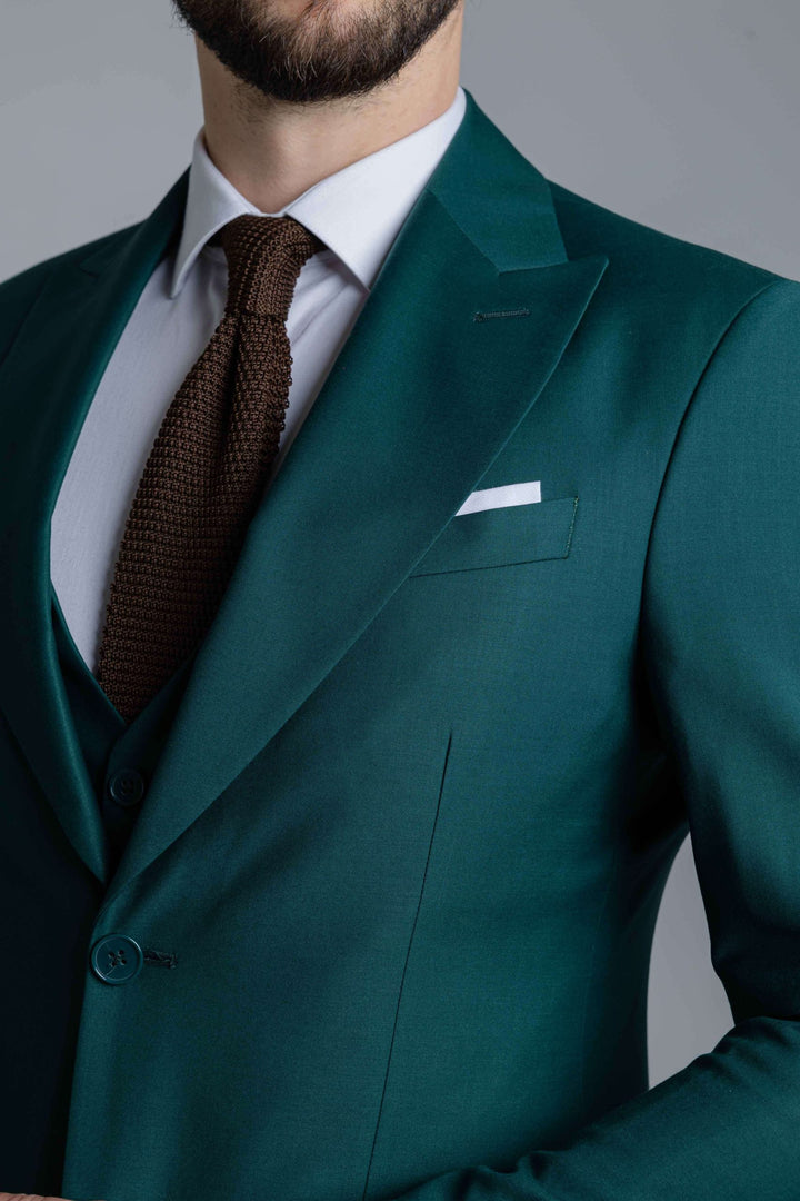 Trijų dalių žalias kostiumas