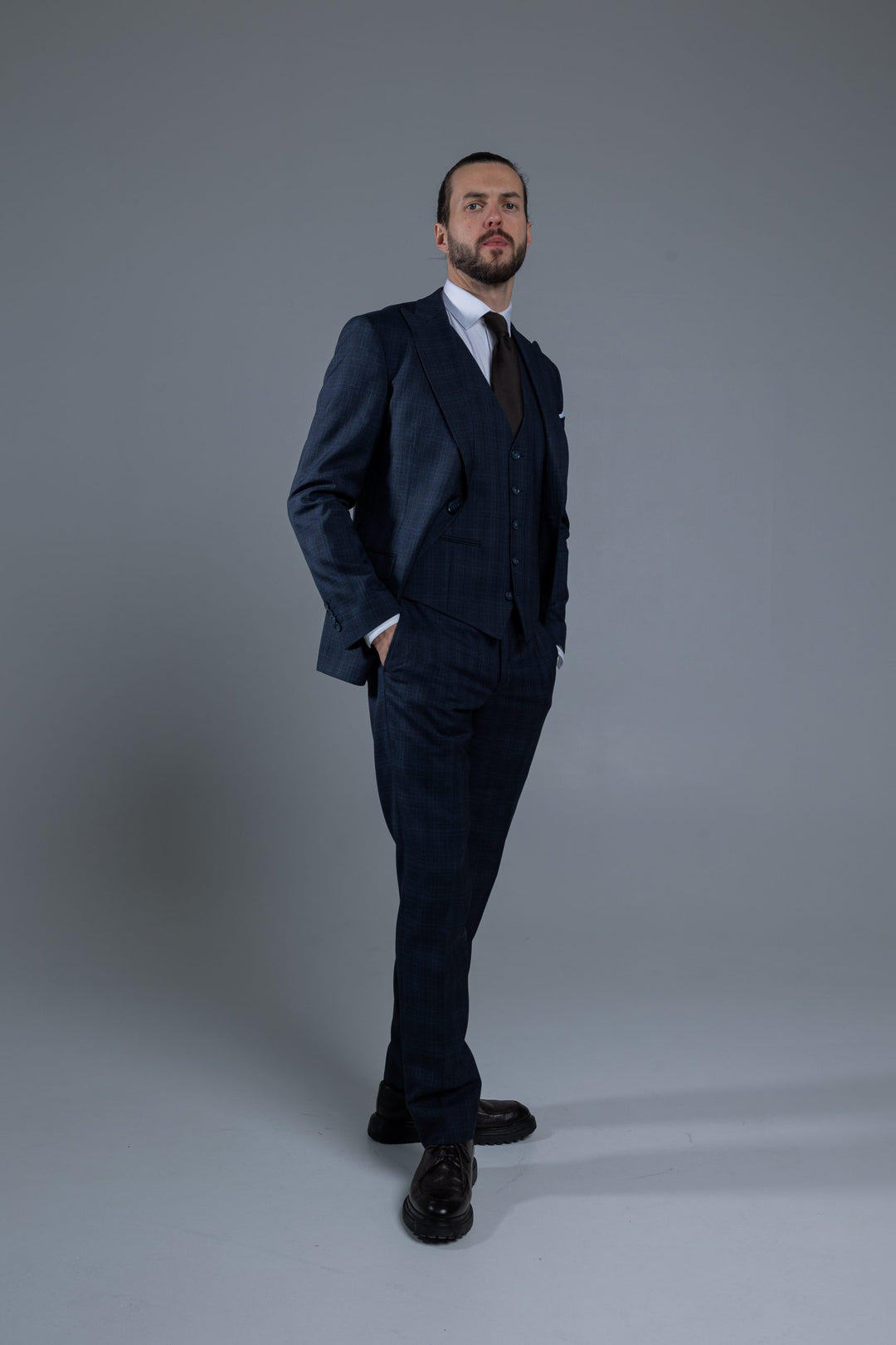 Three-piece navy blue checked suit